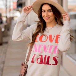 Love Never Fails Graphic Crewneck