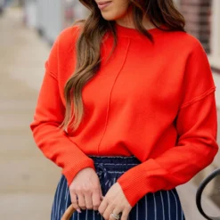 Raw Stitched Side Slit Sweater